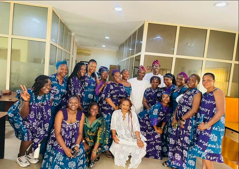 Cedar Microfinance Bank staff in matching purple and blue Ankara outfits for Ankara day during Customer Week 2026
